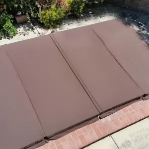 4 piece  red- brown spa cover: 5200mm by 2250mm with a 250mm corner radius